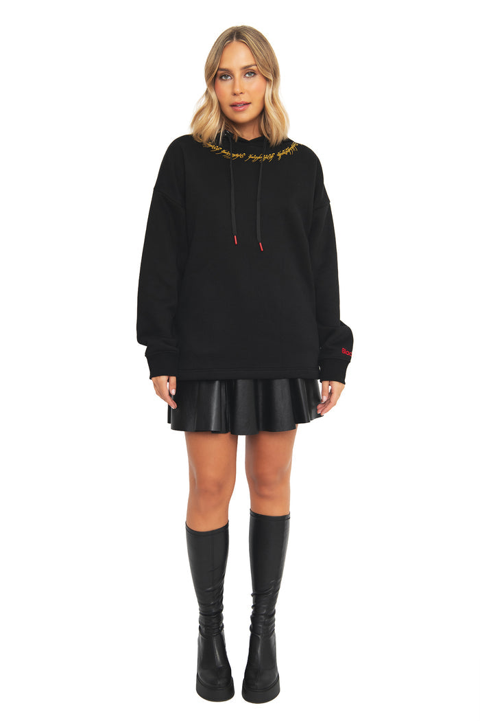 Front full-length view of the BlackMilk One Ring hoodie styled with black bottoms and boots — an oversized, gothic streetwear take on Lord of the Rings fashion inspired by the One Ring's power over Middle-earth.