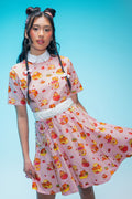 Pastel mini tee dress featuring adorable raccoons, red pandas, shibas, strawberries, cakes and pastries in a playful all-over café-inspired print with a flattering skater silhouette.