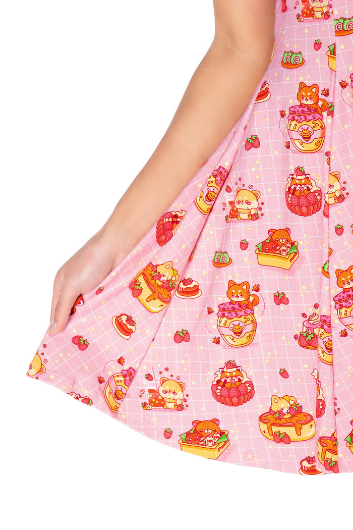 Pastel animal print skater dress with adorable raccoons, shibas, red pandas and sweet treat illustrations, designed with a fitted bodice and casual mini tee dress shape.