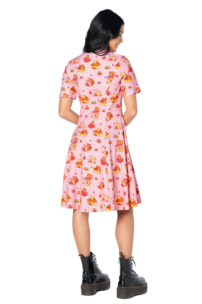 Cute bunny print longline tee dress with pastel cakes, strawberries, sweet treats and rabbit illustrations, finished with a crew neckline and comfortable relaxed fit.