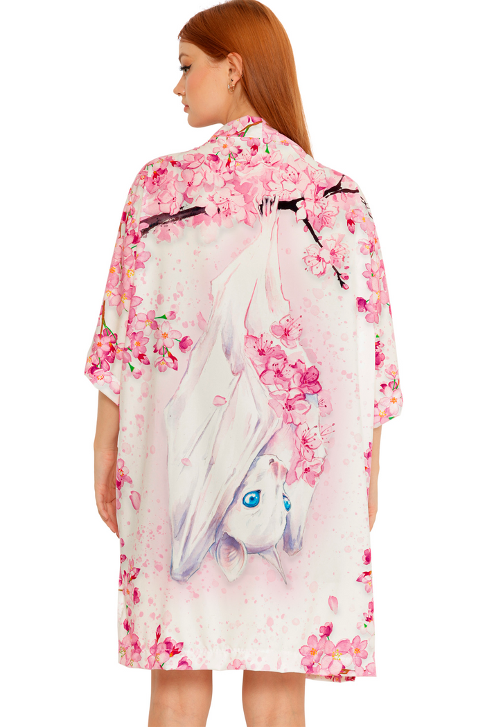 Lora Zombie Pearl in Sakura Robe worn open, showcasing a relaxed silhouette, wide sleeves, and flowing drape.