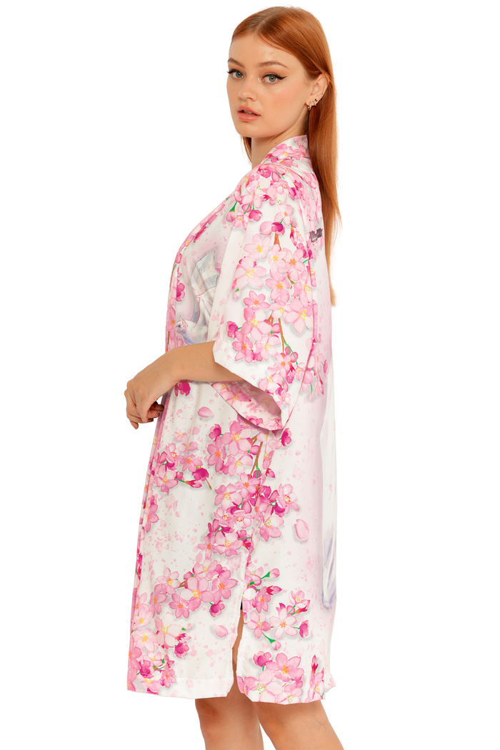 Pink floral robe from the Lora Zombie collection highlighting soft pastel tones and detailed artwork placement.
