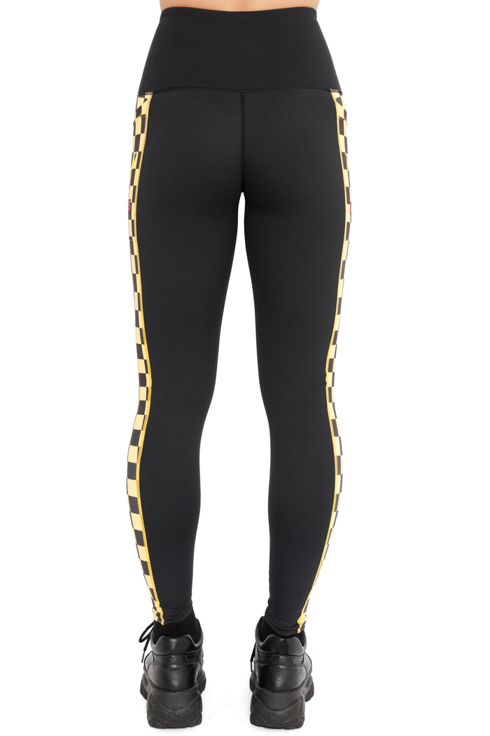 Pokémon Pikachu high waisted leggings with nostalgic checkerboard side panel, black ninja pants inspired by classic Pokémon games