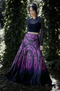 Gothic maxi skirt with cathedral inspired spider web artwork in vivid purple and black tones, flowing through a dramatic full-length silhouette. This whimsigoth skirt blends dark fairycore, fantasy witch and gothic fashion aesthetics with elegant movement and haunted cathedral energy.