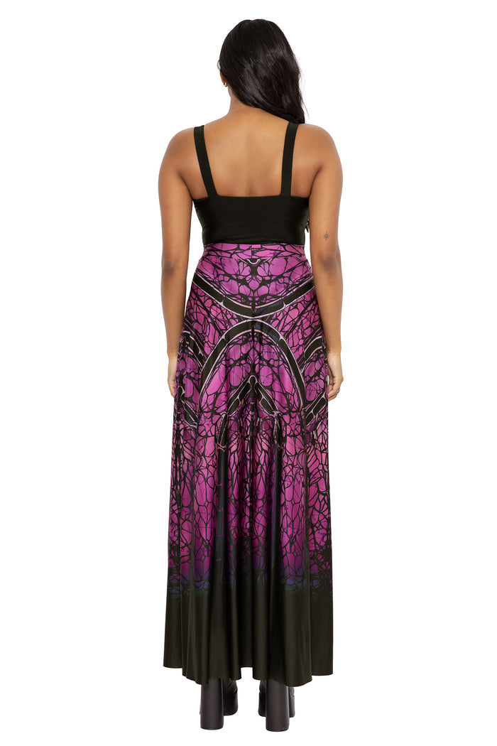 Gothic cathedral inspired maxi skirt with dramatic web detailing stretched across silky flowing fabric like dark stained glass. This alternative witchcore skirt captures fantasy witch and dark academia fashion with romantic haunted architecture inspired styling.