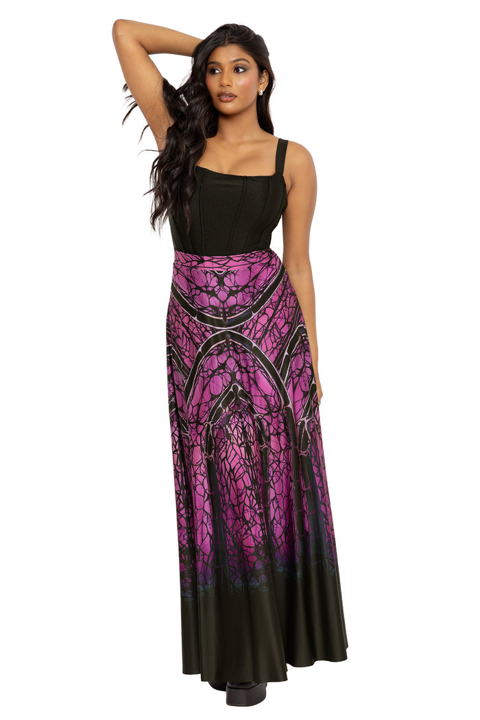 Fantasy witch inspired maxi skirt featuring intricate gothic web artwork and cathedral inspired symmetry in bold purple and black tones. This dark fairycore skirt combines elegant movement with alternative goth fashion and dramatic witchcore styling.