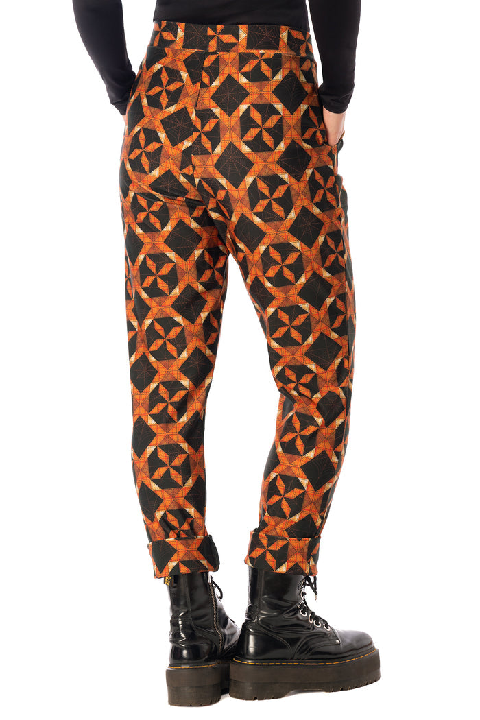BlackMilk Pumpkin Patchwork Cuffed Pants – orange pumpkin and slasher print cuffed Halloween pants, part of the BlackMilk Clothing Halloween collection