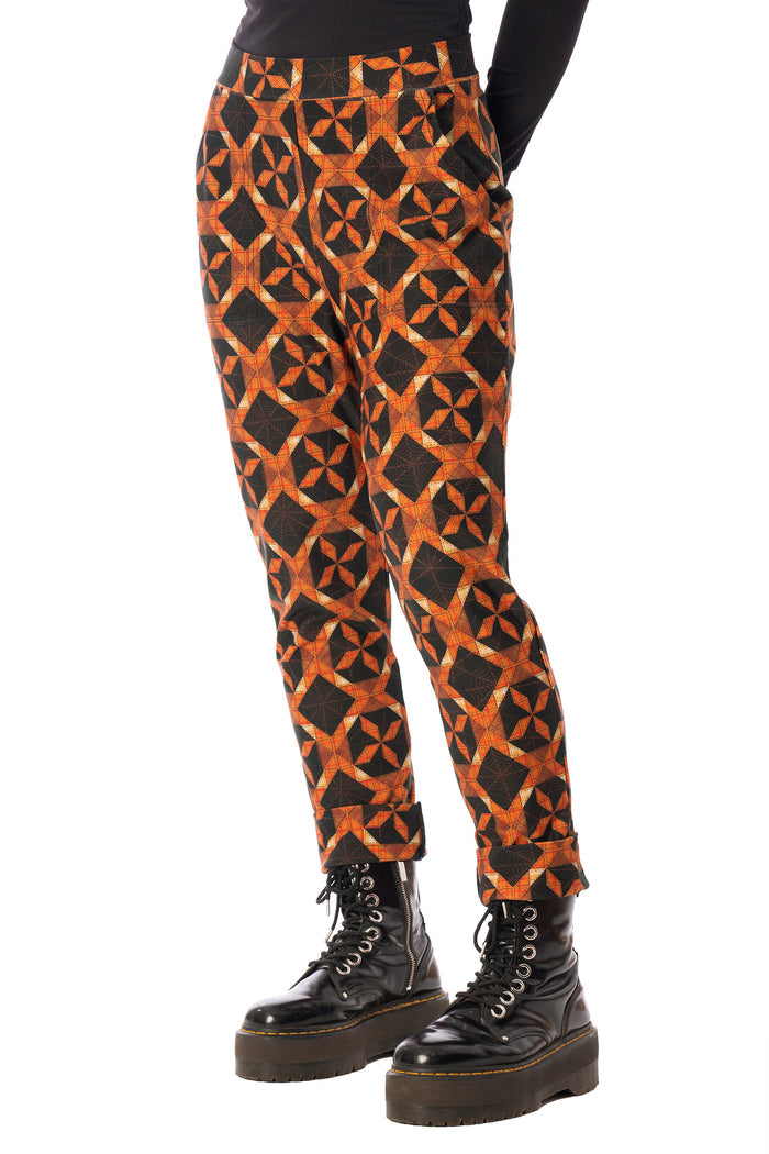 BlackMilk Pumpkin Patchwork Cuffed Pants – orange pumpkin and slasher print cuffed Halloween pants, part of the BlackMilk Clothing Halloween collection