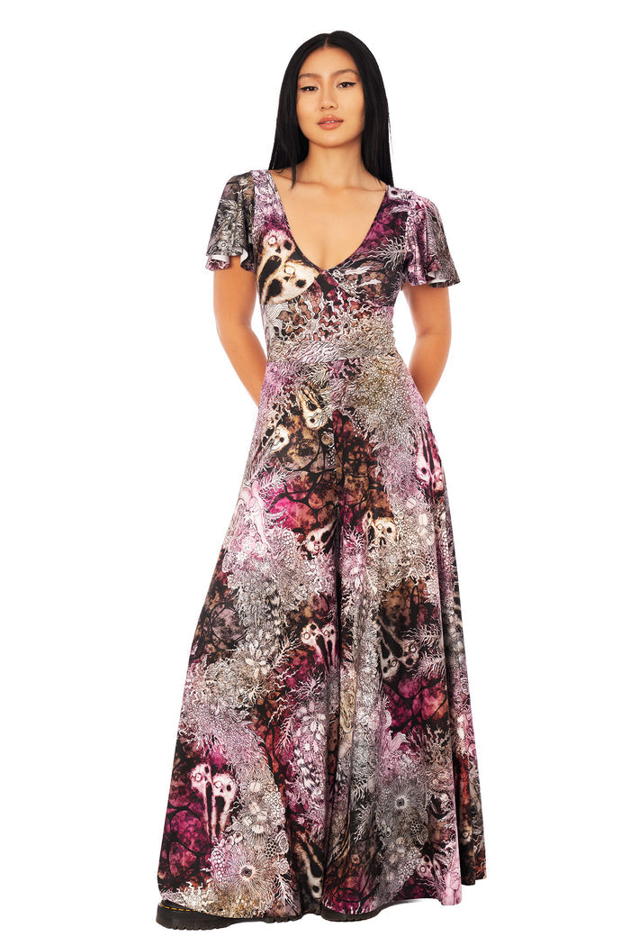Screaming Wreaths Marilyn jumpsuit from the Junji Ito x BlackMilk collaboration, wide leg gothic jumpsuit featuring No Longer Human artwork in pink, black and burgundy tones.