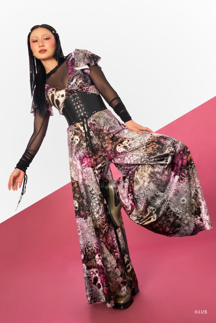 Junji Ito Screaming Wreaths Marilyn jumpsuit in Luxe fabric, dramatic wide leg gothic fashion piece with deep V neckline and horror art print.