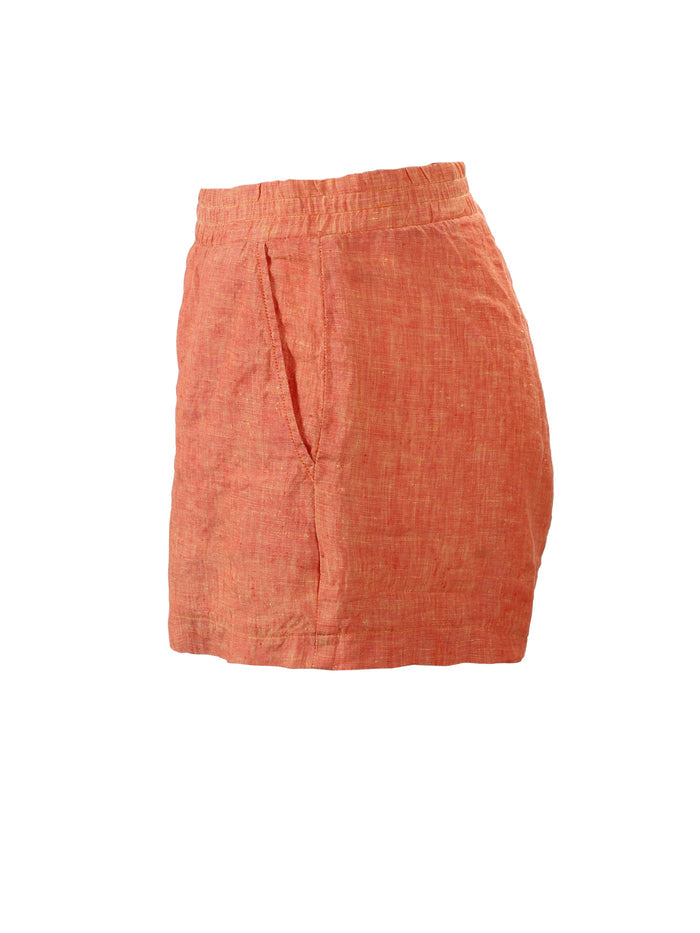 A side view of the Finley seaside short, a 100% linen pale blue shorts with an elastic waistband, a 3" inseam, and pockets.