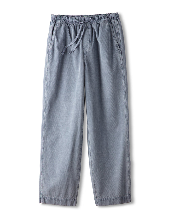 Blue cord pants with drawstring on a white background