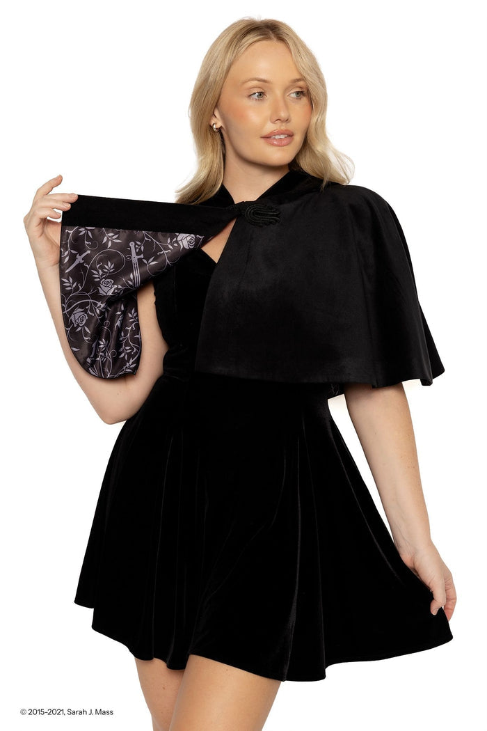 A Court of Thorns and Roses Night Court hooded cape, black velvet ACOTAR inspired cloak by Sarah J Maas with flowing silhouette, frog clasp neckline and hidden floral lining, gothic fantasy outerwear inspired by ACOTAR books