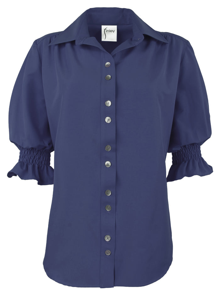 Front view of navy button-down poplin blouse with elbow puff sleeves and smocked cuffs. Relaxed shape.