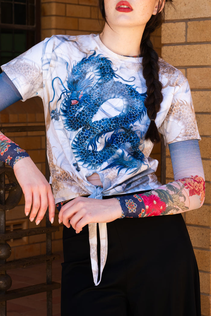 Short sleeve tie front top with smoke graphic design, fitted silhouette and soft stretch fabric