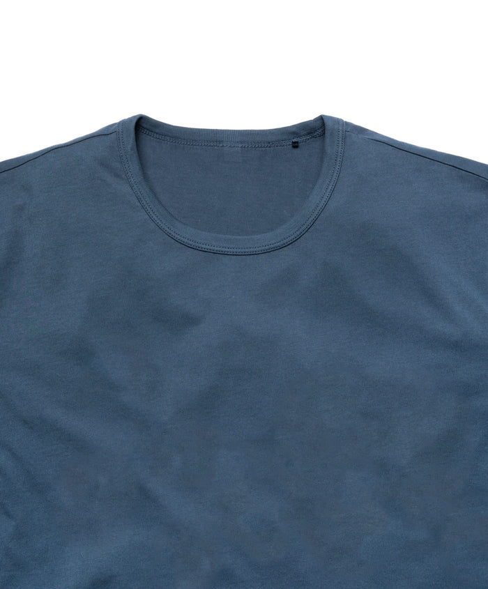 Closeup of collar of blue crew neck t-shirt