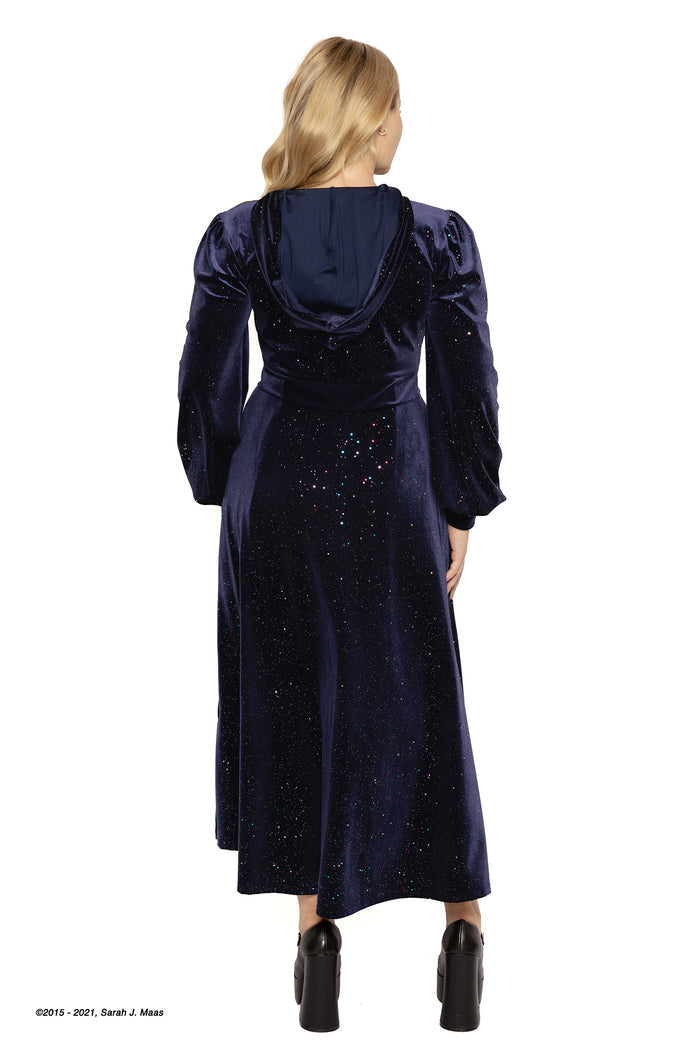 Navy velvet Starfall hooded maxi jacket ACOTAR inspired, A Court of Thorns and Roses series coat by Sarah J Maas with star foil pattern, long silhouette, gathered sleeves and buckle closures, fantasy fashion piece