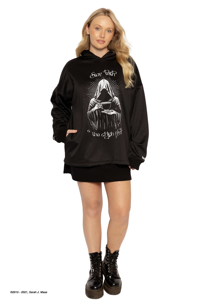 Black oversized Suriel hoodie ACOTAR inspired, A Court of Thorns and Roses series hoodie by Sarah J Maas with graphic print, fleece lined fabric, unisex fit and cosy hood, relaxed fantasy fashion piece