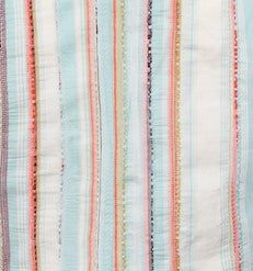 Textile with multicolored vertical stripes on a white background