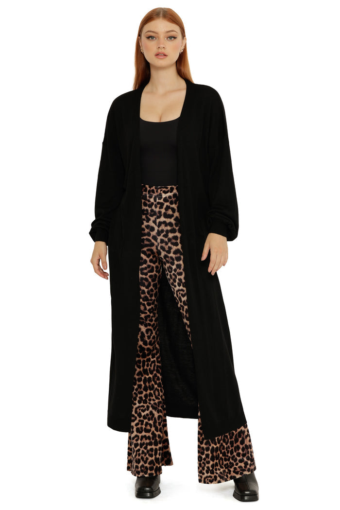 Full-length Black Super Cardigan worn open, featuring a longline silhouette, relaxed fit, and soft knit fabric.