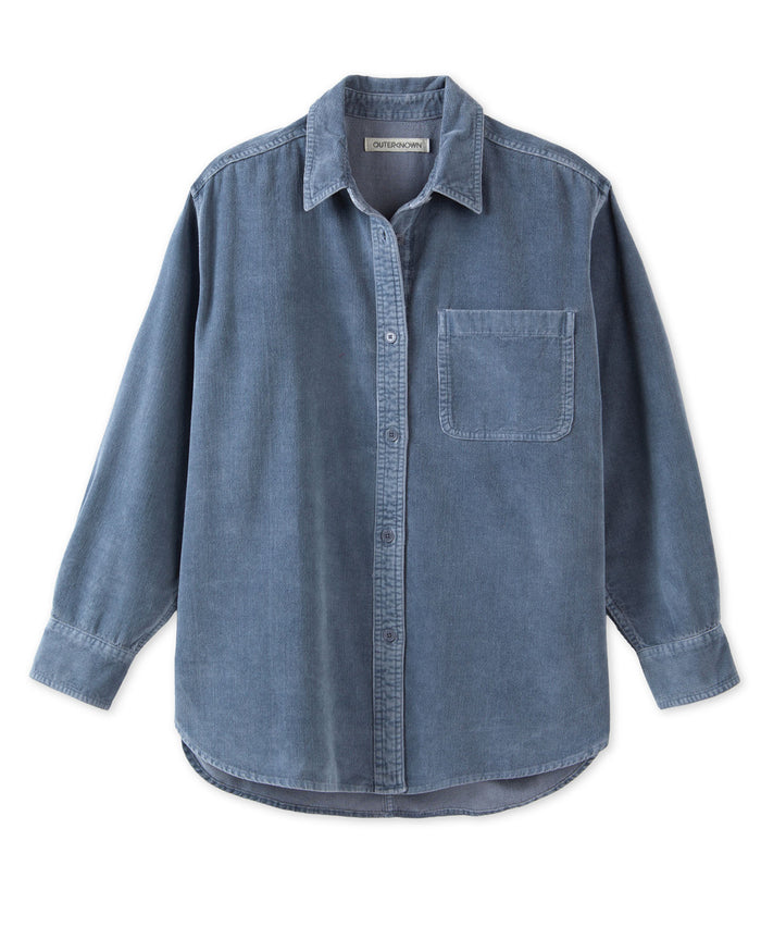 Blue corduroy shirt on a white background