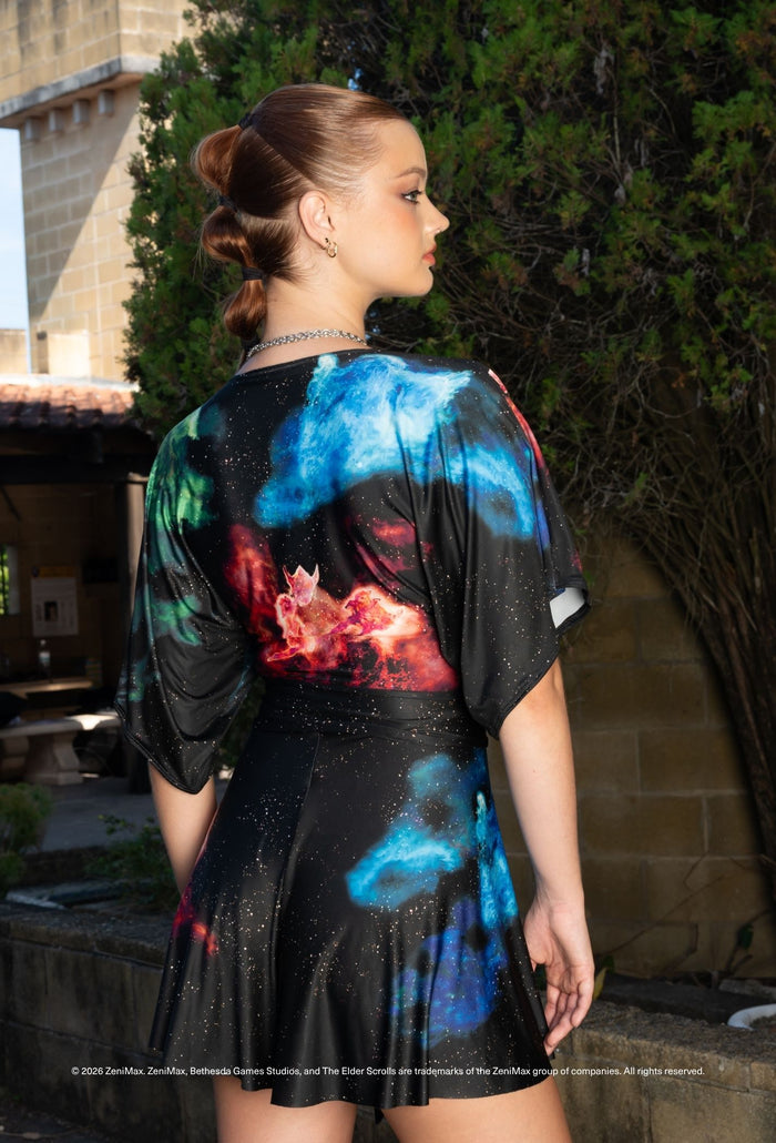 Elder Scrolls fashion playsuit featuring slinky fabric, V neckline, tie waist detail and galaxy print inspired by tank healer DPS roles