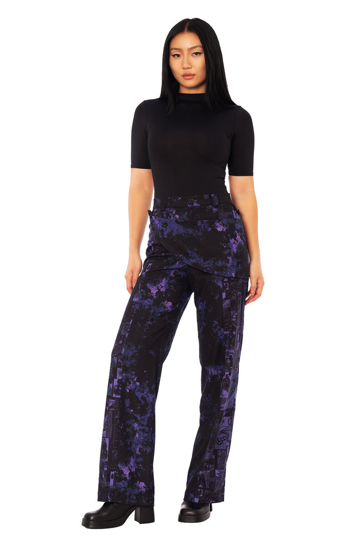 High waisted Junji Ito clothing Uzumaki trousers featuring multi-way drape panels and graphic manga artwork in deep black and bruised purple.