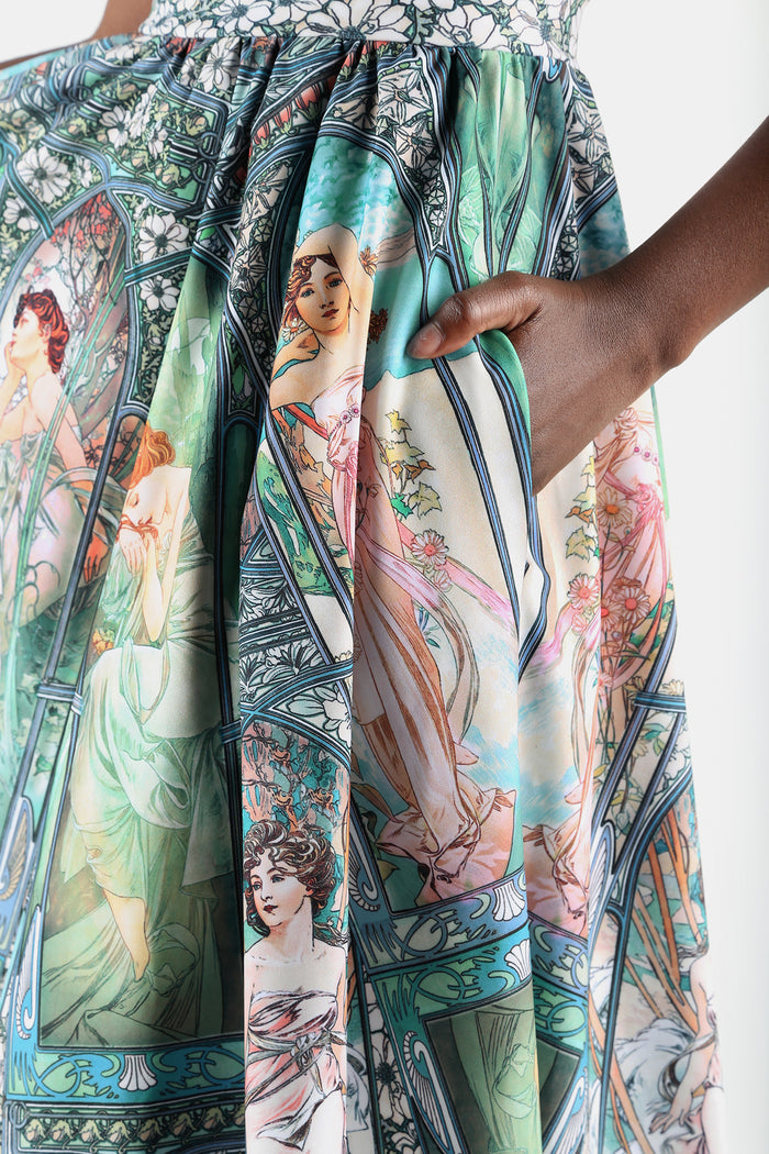Printed midi skirt with pockets and Times Of Day artwork, designed for comfortable all-day wear across office outfits, weekend plans and elevated everyday fashion.