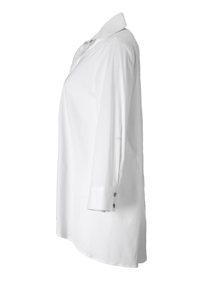A rear view of the Finley trapeze top, a black button-down tunic blouse with an A-line shape and a relaxed fit.
