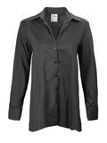 A front view of the Finley trapeze top, a black long-sleeve button-down blouse with a relaxed fit and an A-line shape.