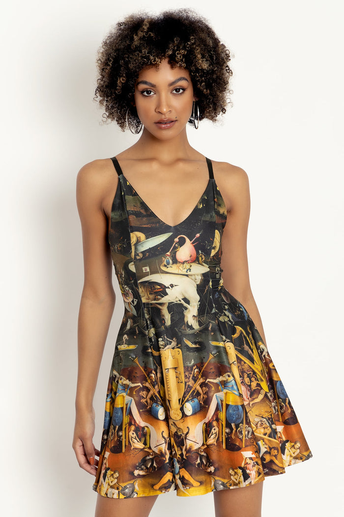 Women's printed mini dress with adjustable straps, combining a flattering fit and statement artwork for warm-weather fashion and day-to-night outfits.