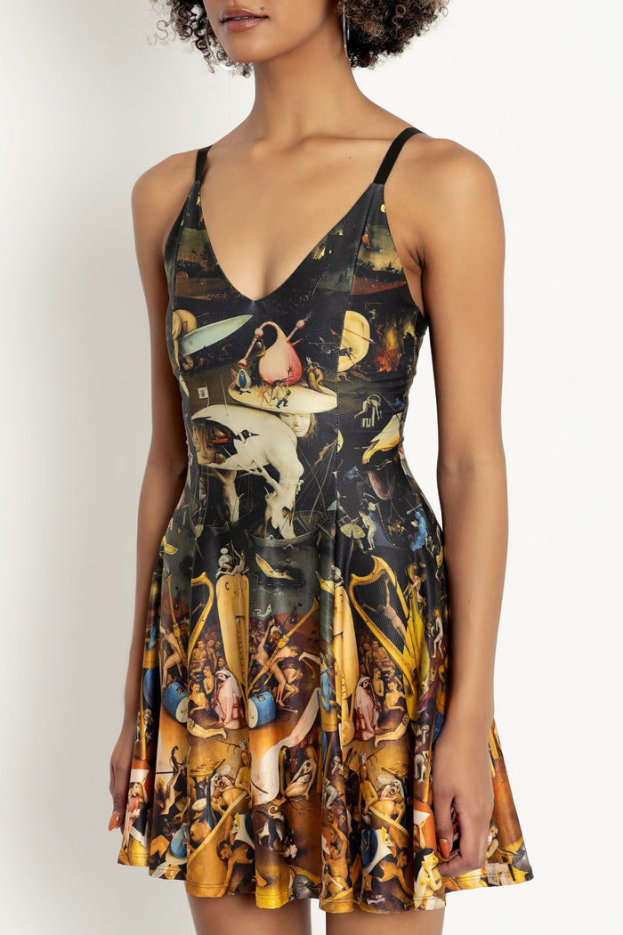 Unearthly Delights mini dress with strappy neckline and playful print, perfect for summer wardrobes, vacations, brunch dates and special occasions.