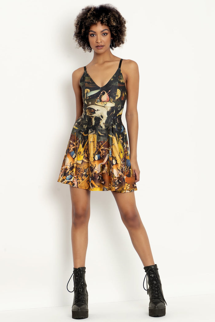 Printed strappy mini dress with flattering silhouette, ideal for festivals, casual outings, holiday styling and elevated everyday fashion.