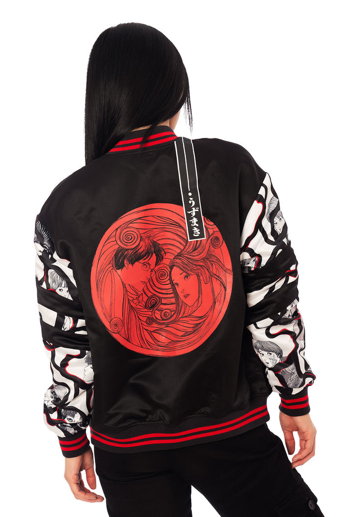 Japanese horror anime bomber jacket inspired by Junji Ito Uzumaki, black satin varsity jacket with red spiral artwork and manga print sleeves.