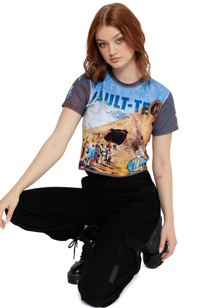 Fallout x BlackMilk cropped baby tee with vintage Vault-Tec design inspired by Fallout’s iconic Vault-Boy and lunchbox art.