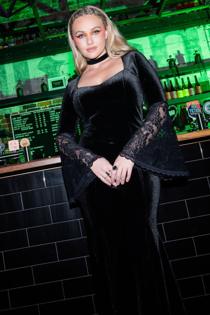 BlackMilk Velvet and Lace Morticia Dress – black velvet gothic Halloween dress with lace bell sleeves, part of the BlackMilk Clothing Halloween collection