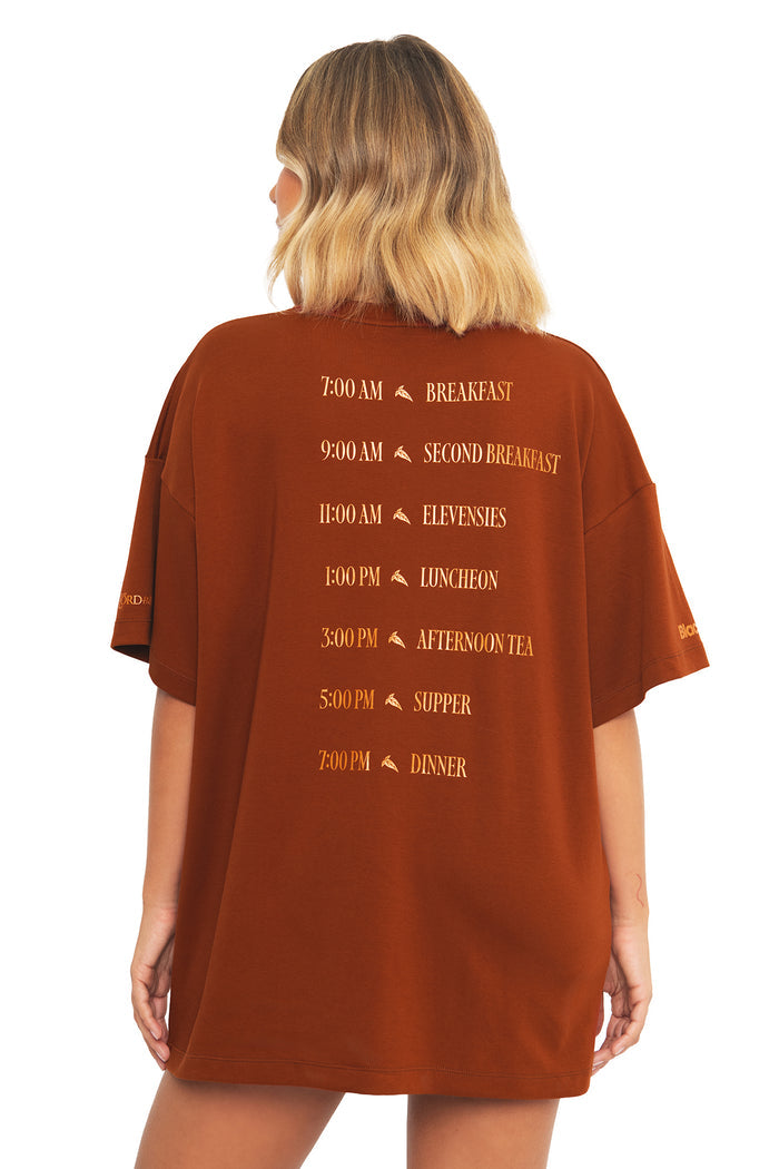 Side profile of the BlackMilk What About Elevenses? Big Tee, showing the oversized silhouette inspired by Merry and Pippin from the Lord of the Rings.